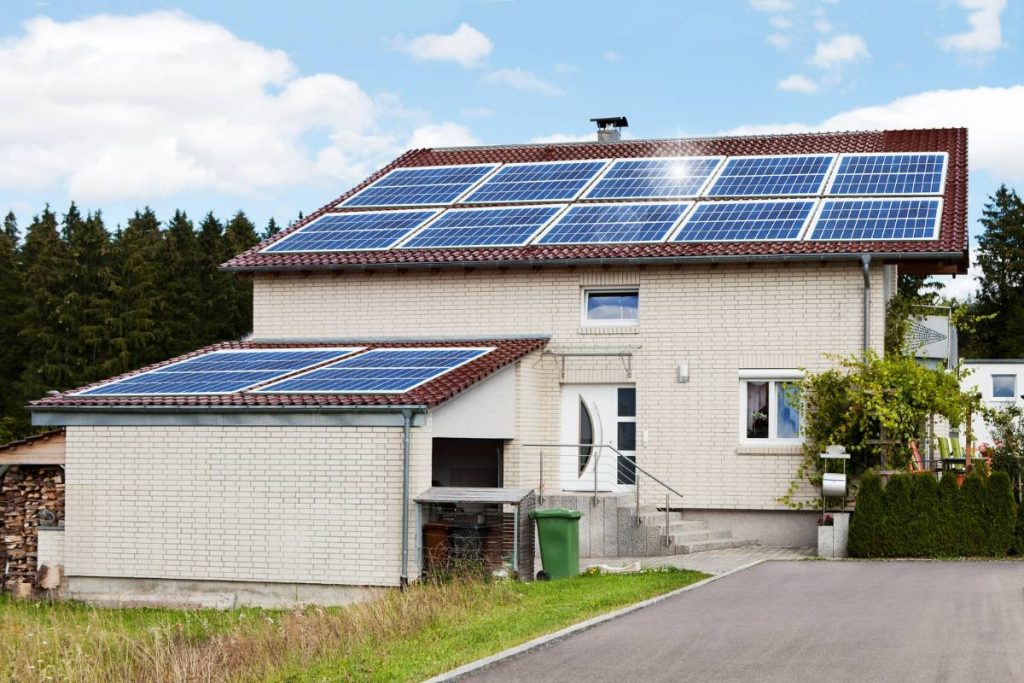 solar panels installed on roof an garage